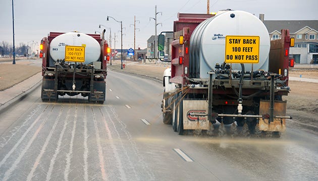 public works truck spraying salt brine